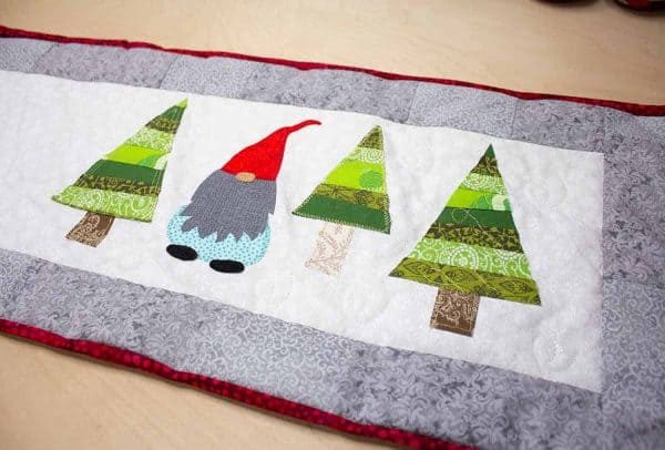 Image shows a Christmas table runner.