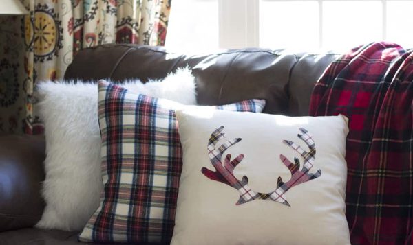 Image shows three festive DIY pillows with a Christmas theme.