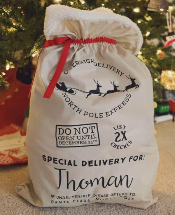 Image shows a Santa sack craft that says "Special delivery for Thoman"