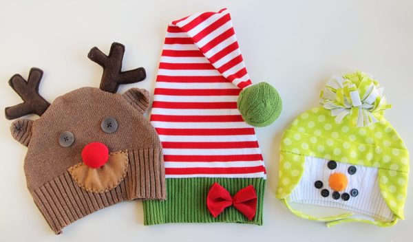Image shows three Christmas hats made from old sweaters. 