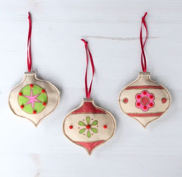 Image shows three sew ornaments made by kids.