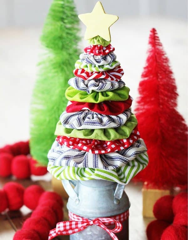 Image shows a fabric yoyo Christmas tree decoration.