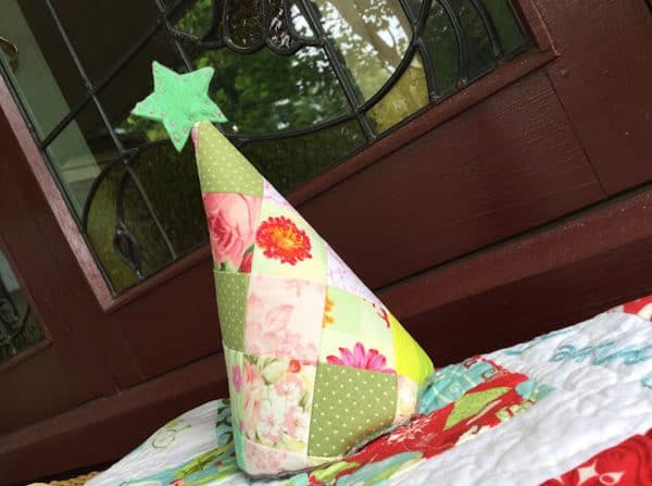 Image shows a patchwork christmas tree softie