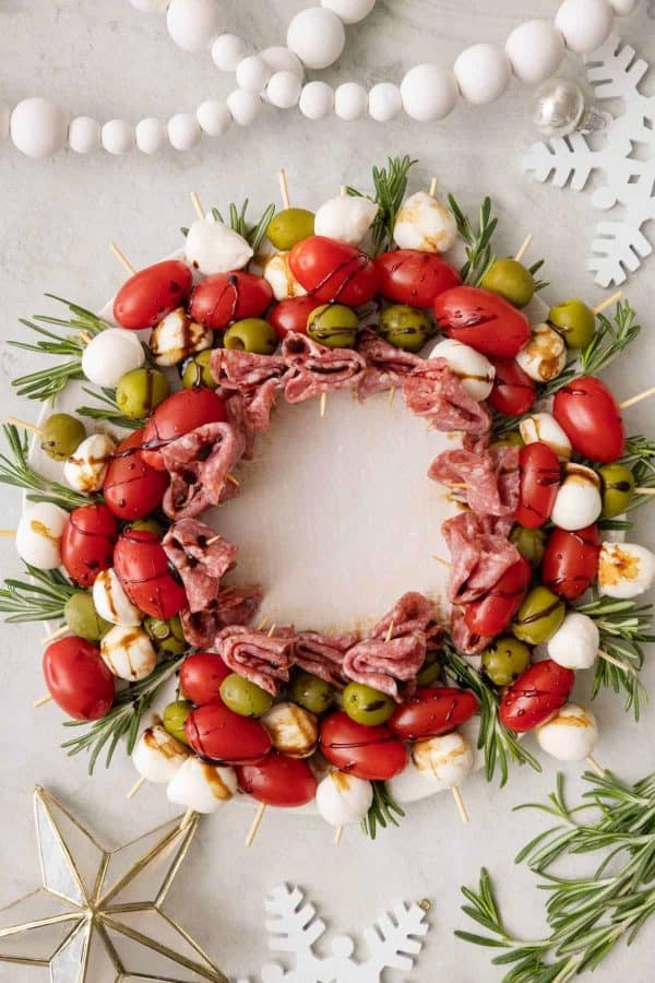 wreath charcuterie board ideas- antipasto skewers with balsamic glaze
