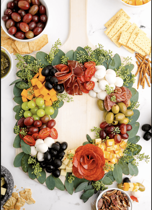 wreath charcuterie board ideas- a pepperoni rose and cheese board