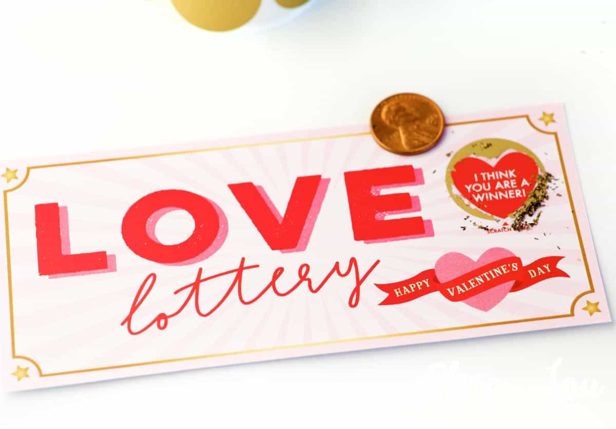 Pink and red love lottery ticket with scratched off message saying, "I think you are a winner!, by Skip to my Lou.