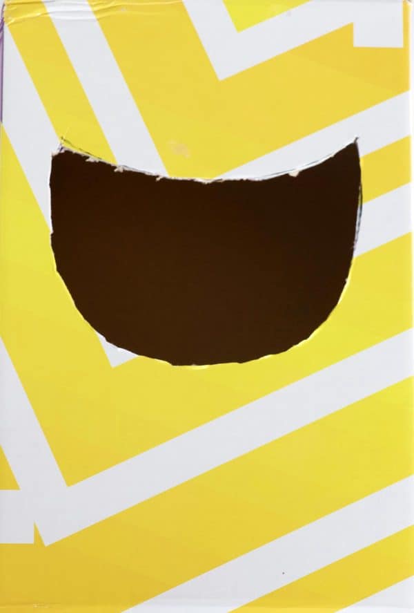 Yellow and white shoebox with shark mouth cut out by Skip to my Lou.