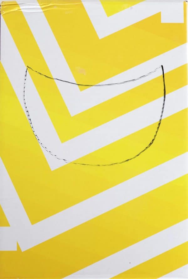 Yellow and white shoebox with a shark mouth outlined in black marker by Skip to my Lou.