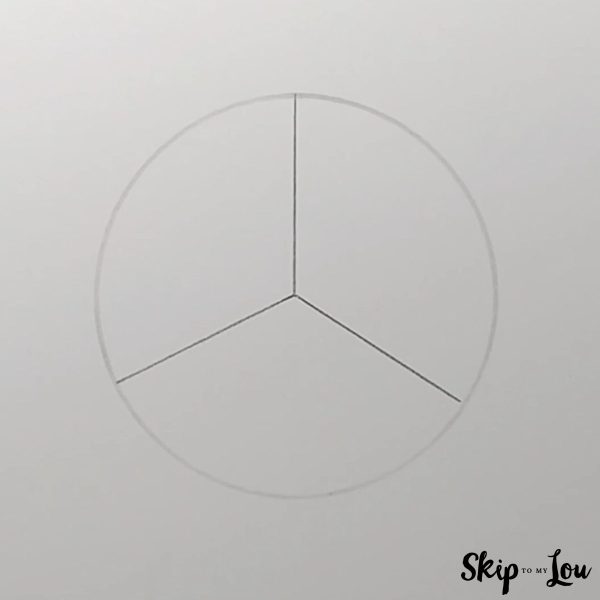 First step to draw a volleyball - circle divided in three parts. Skip to my lou