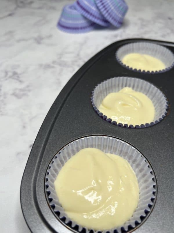 Mini blueberry cheesecake filling in cupcake liners