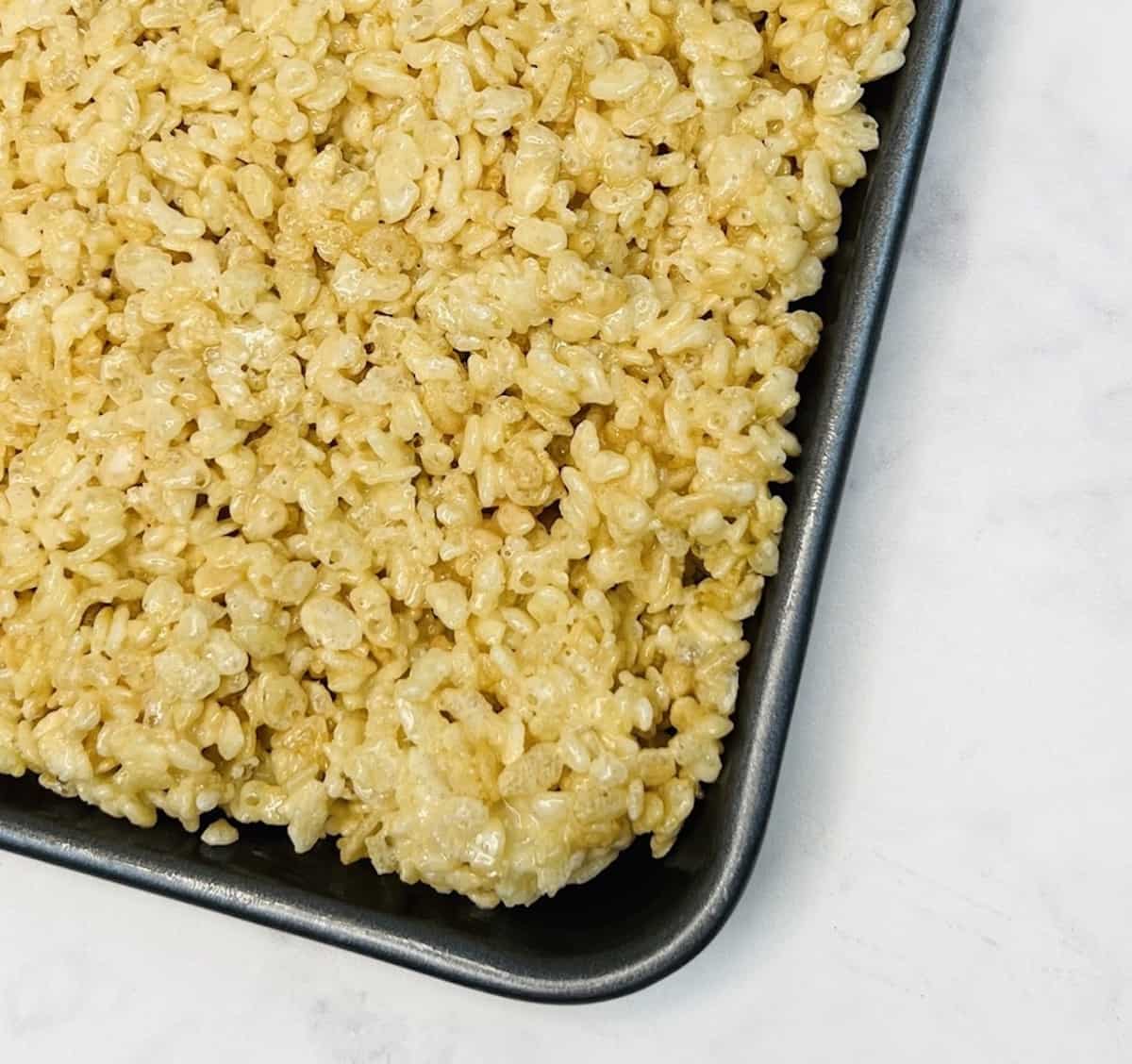 rice krispie treat mixture for valentine rice krispie treats pressed in a pan