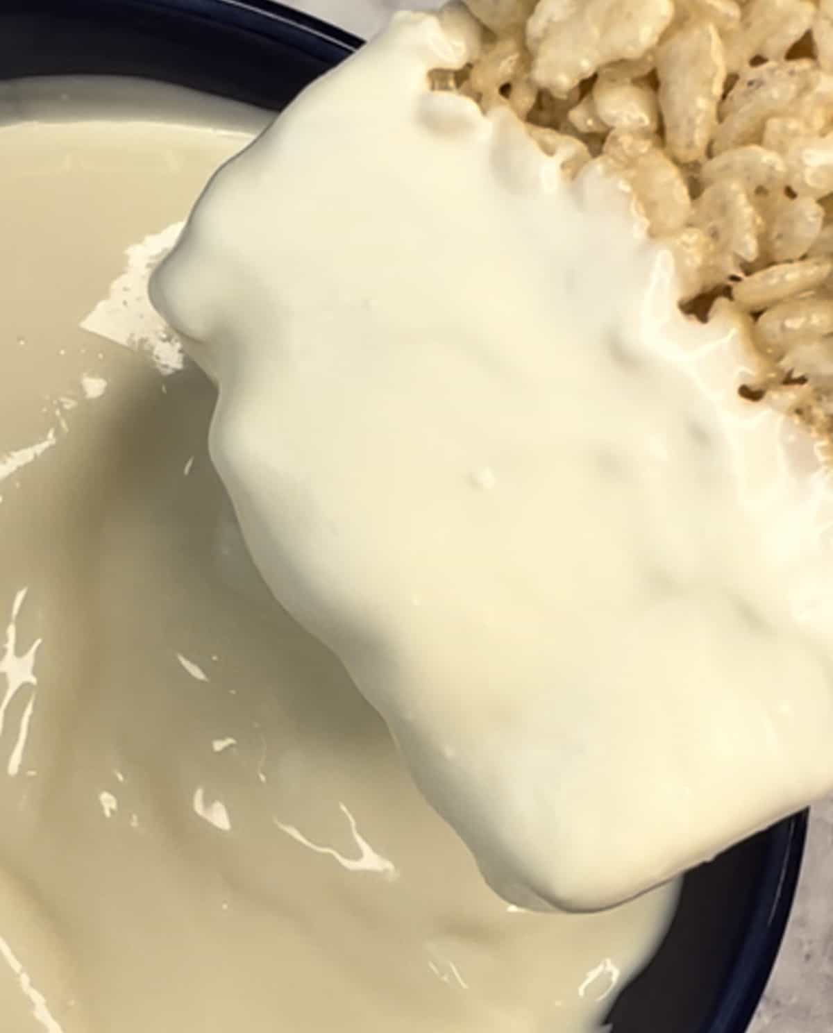valentine rice krispie treat half dipped in white chocolate