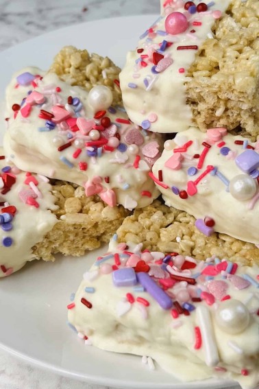 closeup of valentine rice krispie treats on a white plate