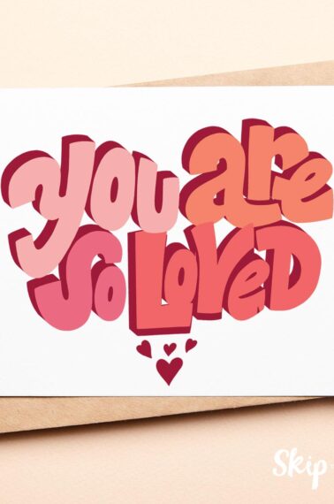you are so loved printable greeting card with kraft colored envelope on peach background