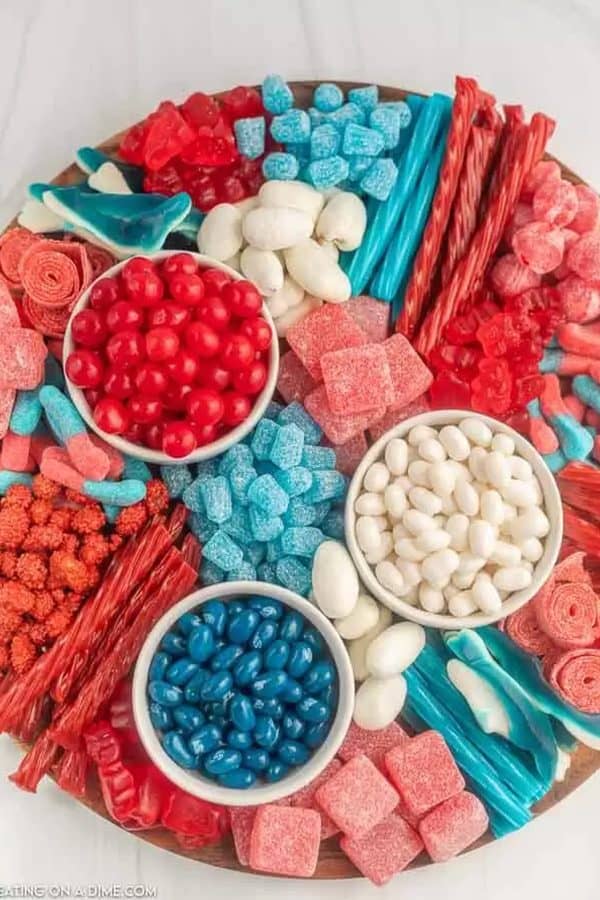 eating on a dime-fourth of july board with red, white, and blue candy