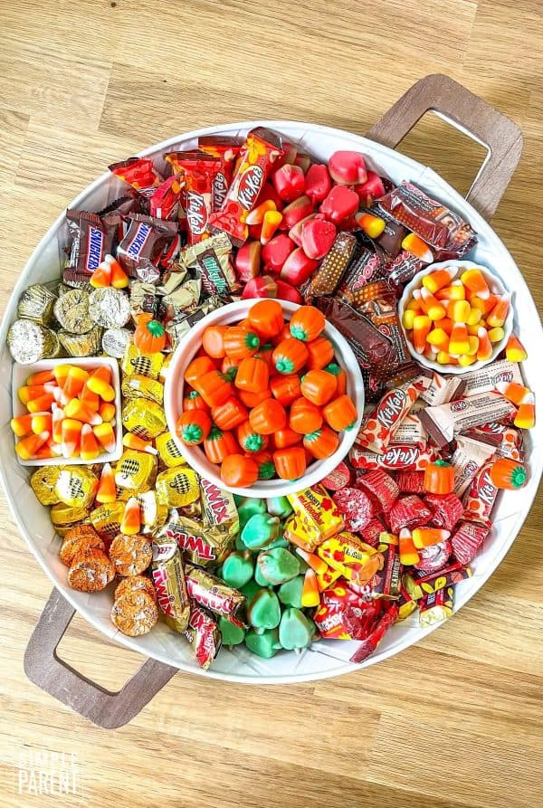 the simple parent- candy charcuterie board ideas-halloween board with candy
