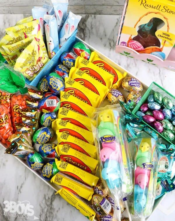 A grab-and-go board with all individually wrapped Easter candies from 3 Boys and a Dog.