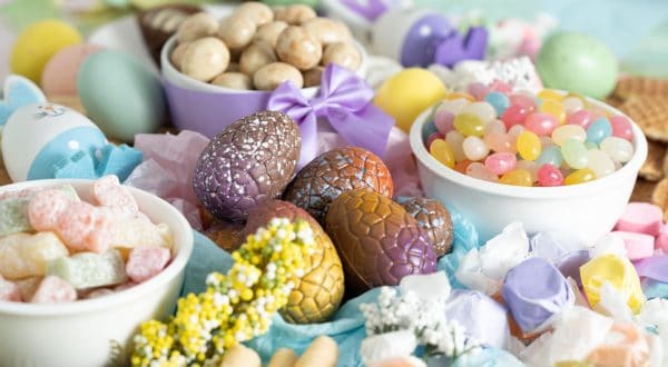 A small board with Easter candies like jellybeans, sour candies, and chocolate eggs from Farm Boy. 