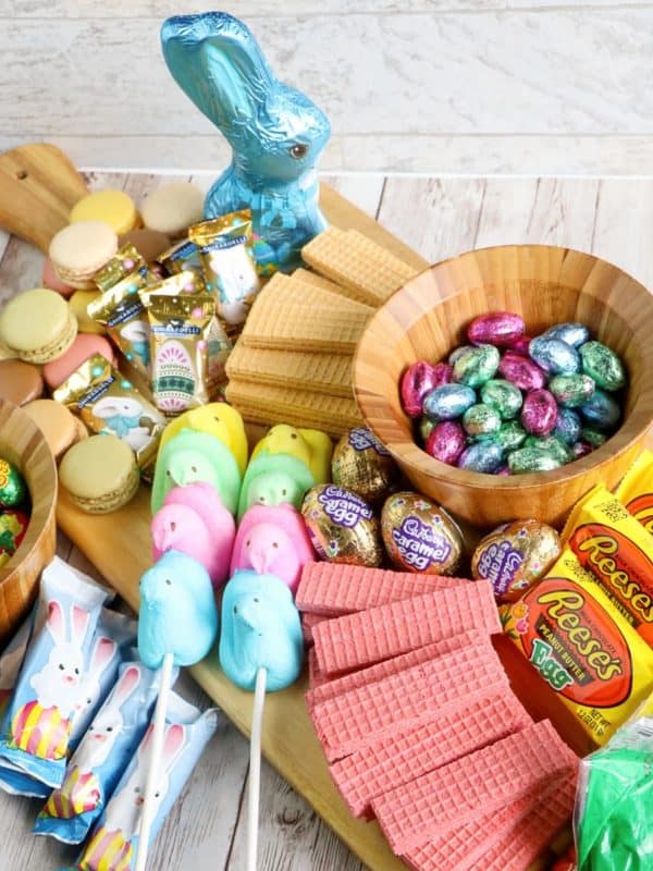 A board with peeps, chocolate eggs, and cadbury caramel eggs from Just is a Four Letter Word. 