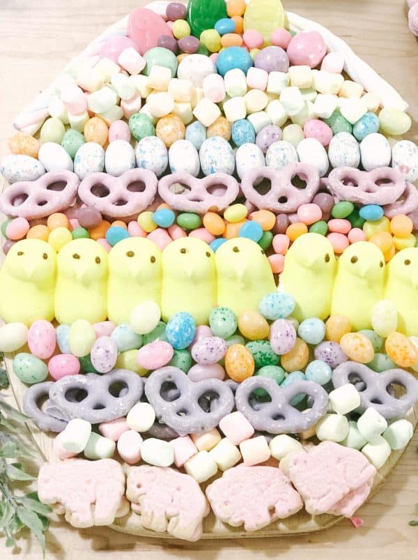 A completely edible and pastel Easter candy charcuterie board from The Curated Farmhouse.