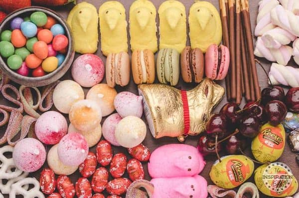 A small Easter charcuterie board from  The Inspiration Edit with cherries, macaroons, and more