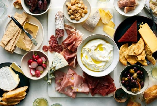 A charcuterie table spread from the Cooking section of the NY Times