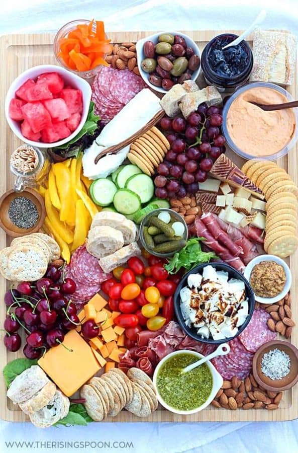 The Rising Spoon has a meat charcuterie board with many options like fruit, veggies, dips, salami, cheese, and more.