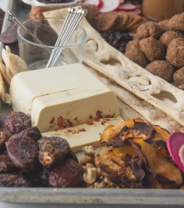 closed loop cooking, a vegetarian board with cheese, dates, bread, and more