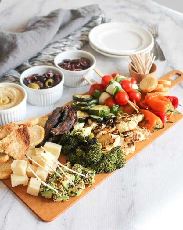 Simply and Savory vegetarian charcuterie board ideas with veggies, cheese, and dips.