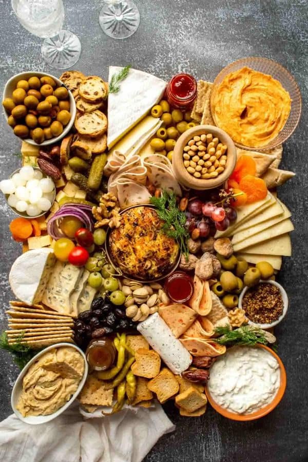 the fiery vegetarian created a charcuterie board with many cheese, cracker, and nut options. 