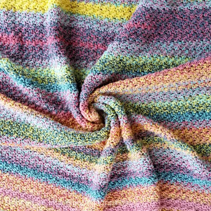 color kaleidoscope blanket swirled on a table