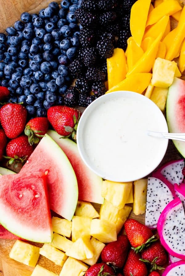 fruit charcuterie board ideas-blackberry babe-board with blueberries, watermelon, dragon fruit and a sweet dip.