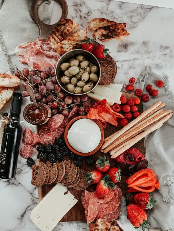 fruit charcuterie board ideas-the communal feast-meat, cheese, and fruit.