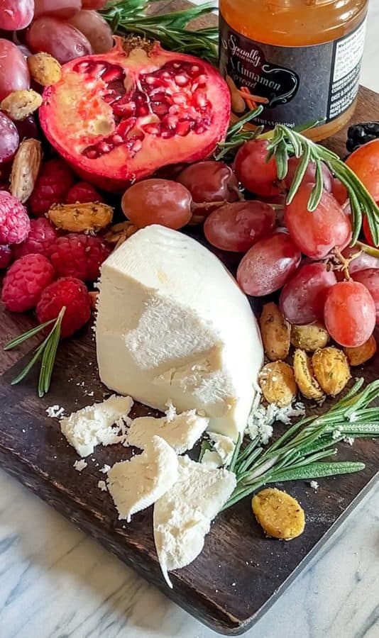 fruit charcuterie board ideas-white kitchen red wine-board with a grapes, and cheese