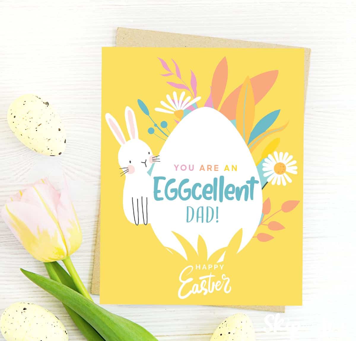 Yellow Happy Easter dad greeting card with an egg, flowers and a rabbit. Text reads Your are an eggcellent dad. from skip to my lou