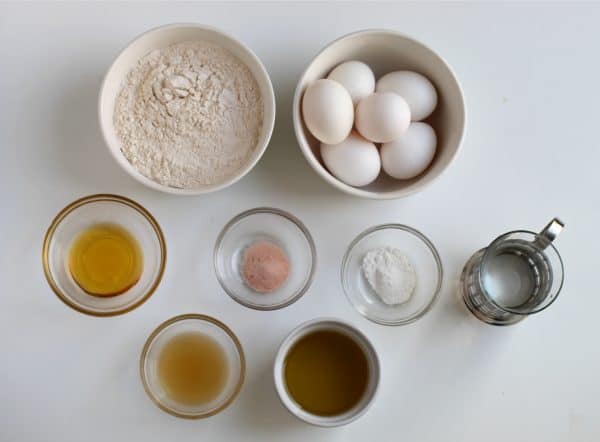 Ingredients for paleo bread: 6 large eggs, 2 cups of cassava flour, baking powder, Himalayan Sea salt, apple cider vinegar, honey, avocado oil, and filtered water, by Skip to my Lou.