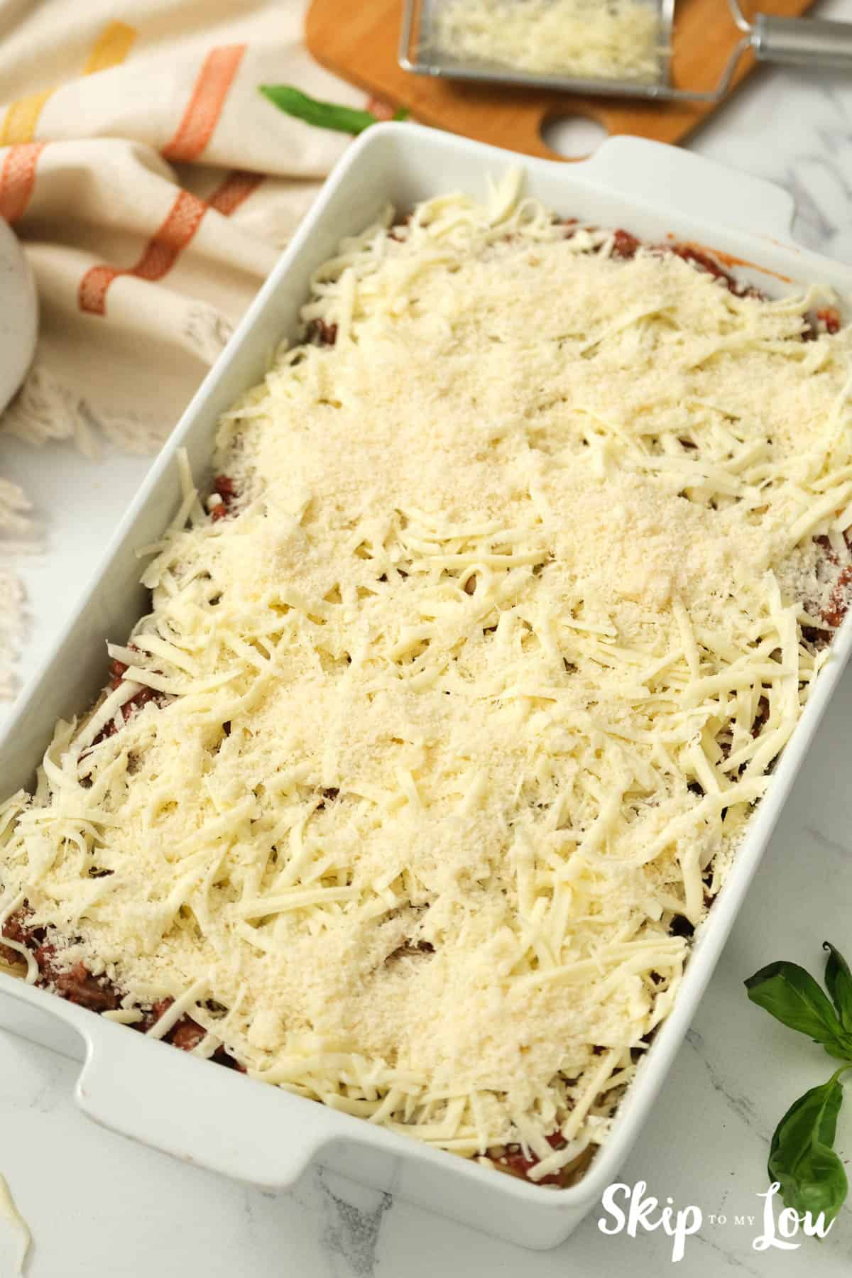 Mozzarella cheese topping Alfredo Spaghetti casserole, by Skip to my Lou.