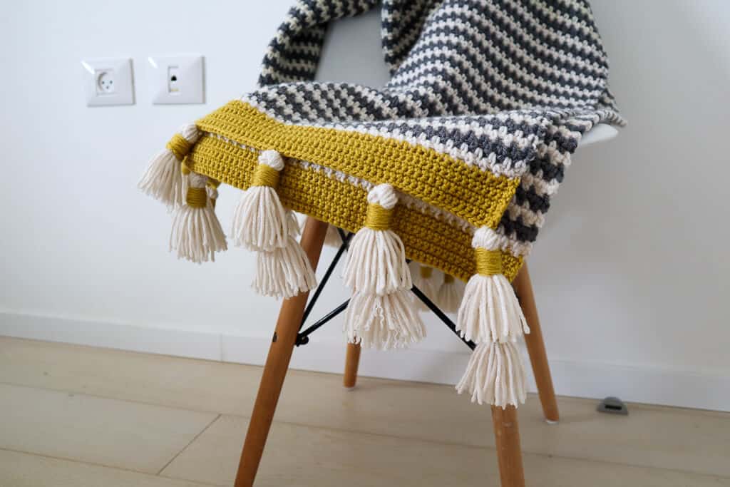 boho stripe blanket on a chair