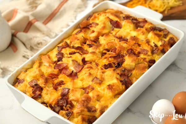 egg strata from Skip to My Lou recipe in a white casserole dish