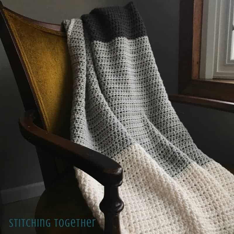 half double crochet blanket on chair