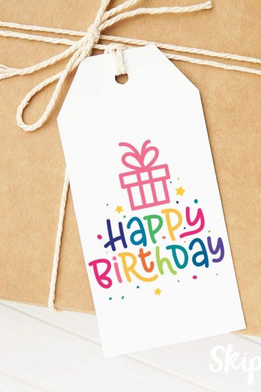 happy birthday tag on a kraft colored package