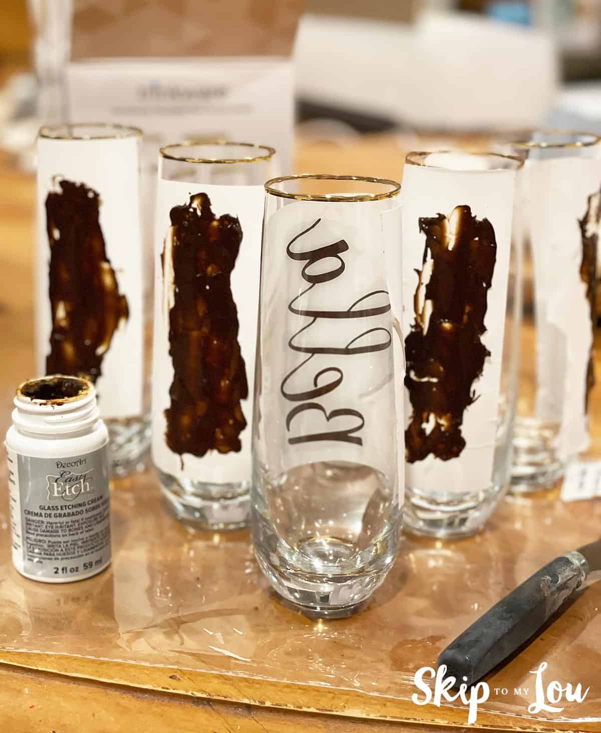 Step 4 - applying etching cream to glass, shown from different angle.