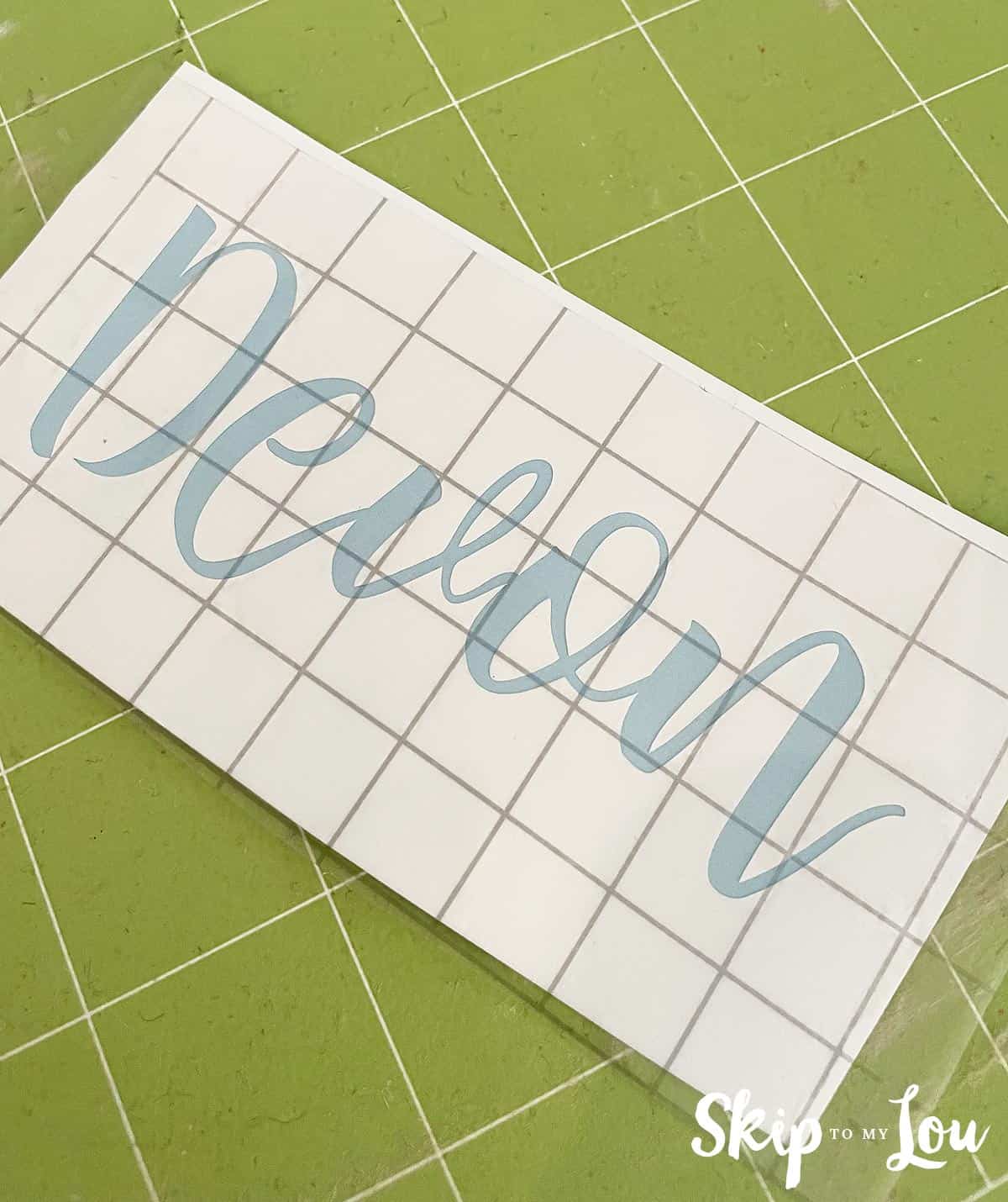 Step 2 to etch glass - cut the design off the vinyl.