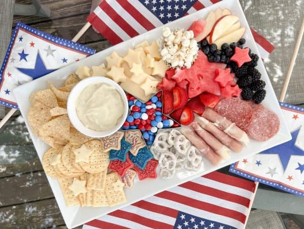 detroit mom created a simple board with meat, cheese, fruit, and a dip. 