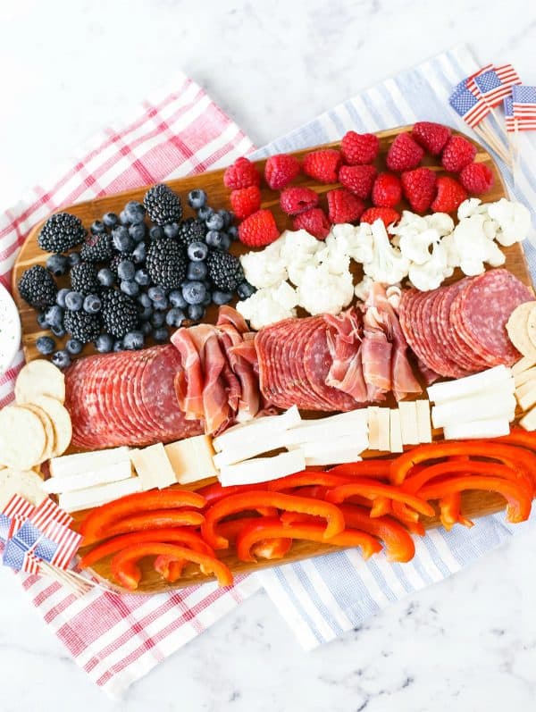 An interesting take on the American flag with meat, cheese, raspberries, blueberries, and more from the pennywise mama.