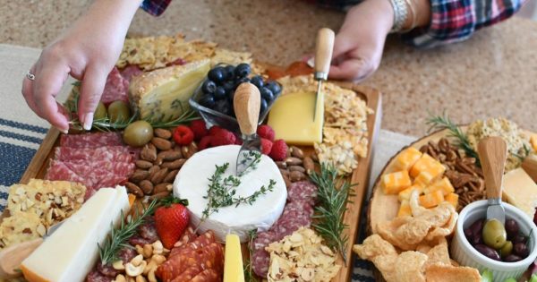 a charcuterie board with plenty of options from hip to keto including cheese, bread, and meat