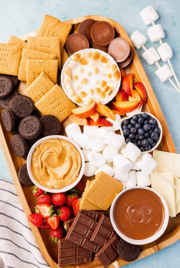 a roasted marshmallow dip, chocolate dip, and peanut butter make this board from A Dash of megnut 