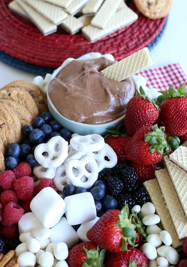 a chocolate dip surrounded by fruits and cookies from Hoosier Homemade 