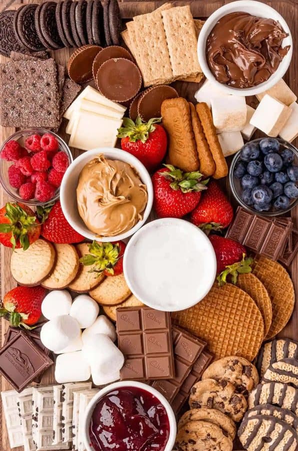 like mother like daughter- s'mores charcuterie board with dips, marshmallows, fruit, and more