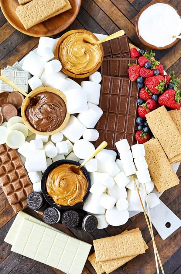 smores charcuterie board-number 2 pencil-a board with cookies, peanut butter, and strawberries